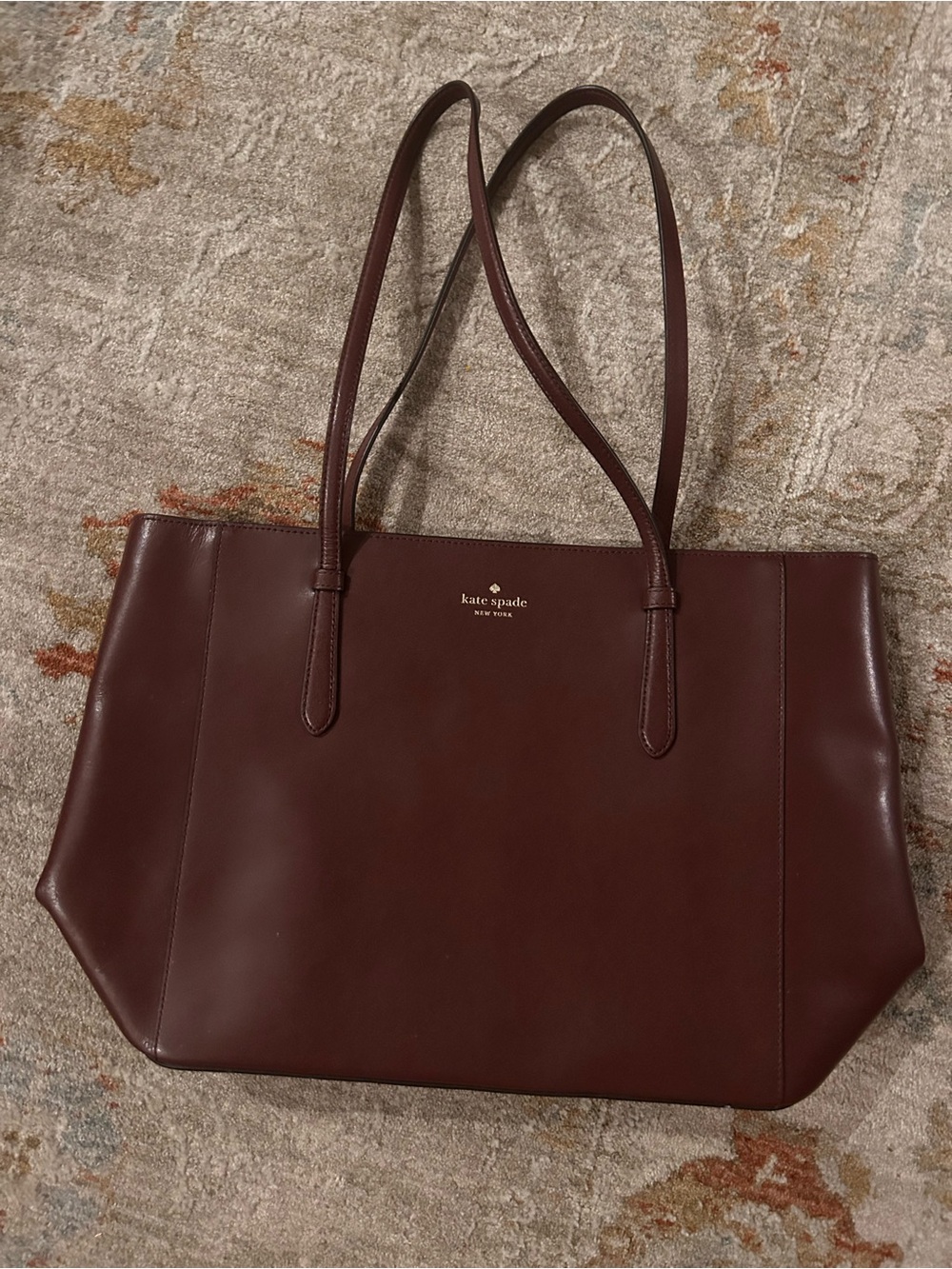 kate spade burgundy large leather tote with gold logo like new condition